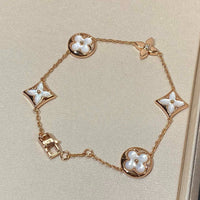 [Aethel jewelry]STAR AND SUN 5 MOTIF MOP PINK GOLD BRACELET